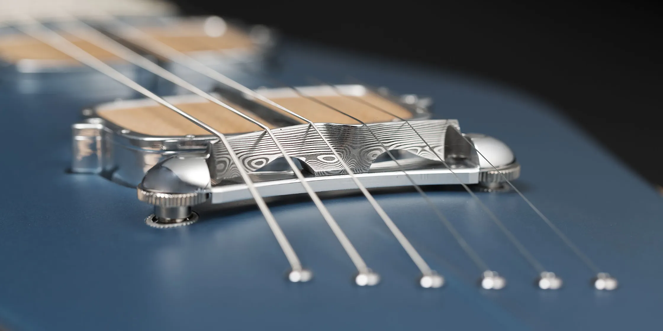 bridge and pickup on the One piece master III guitar