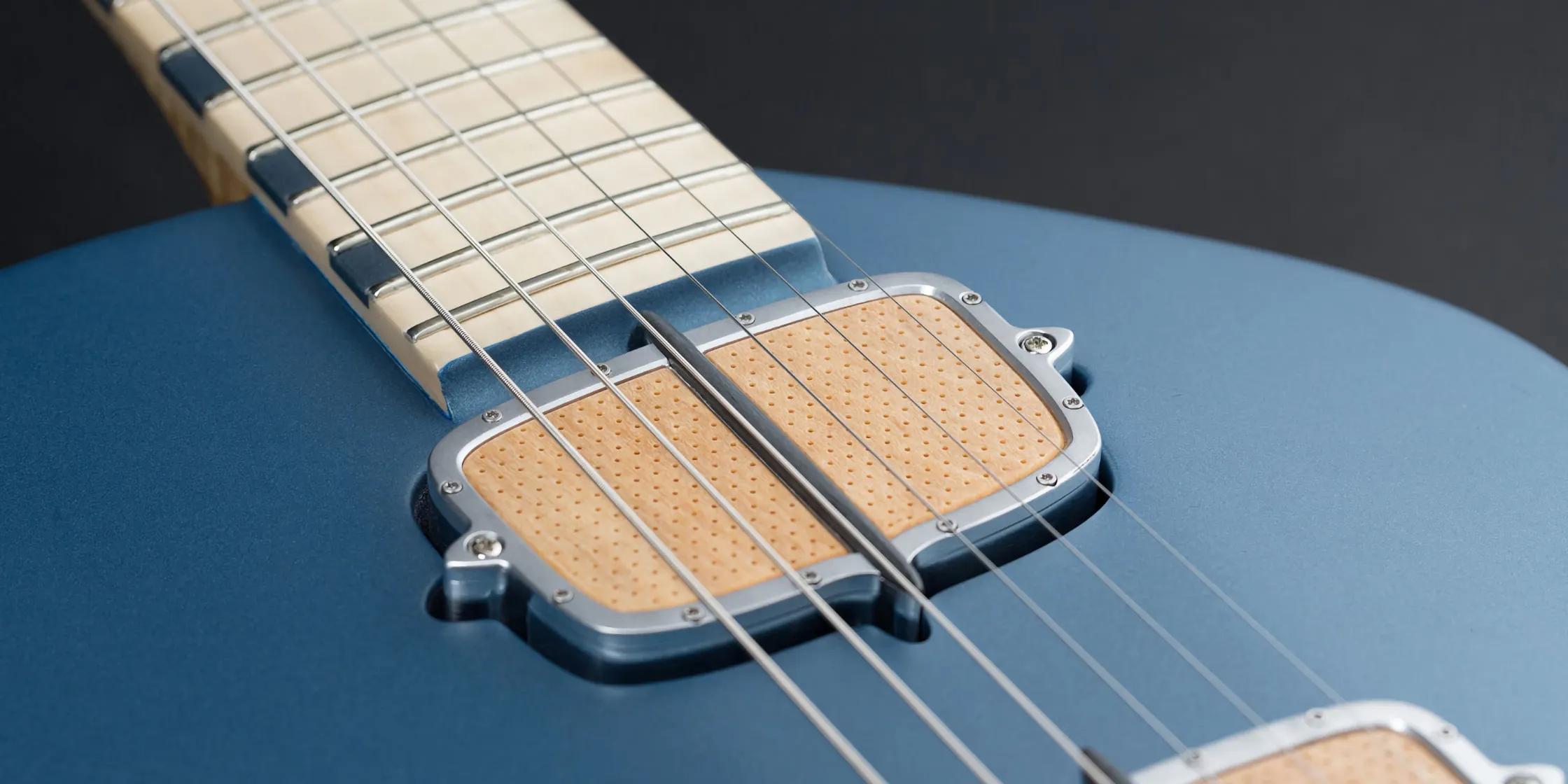 neck and pickup on the One piece master III guitar