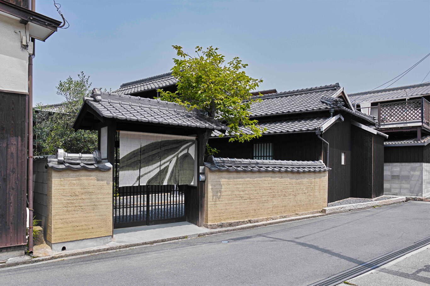 DDAA's store superimposes architectural layers of wooden house in osaka