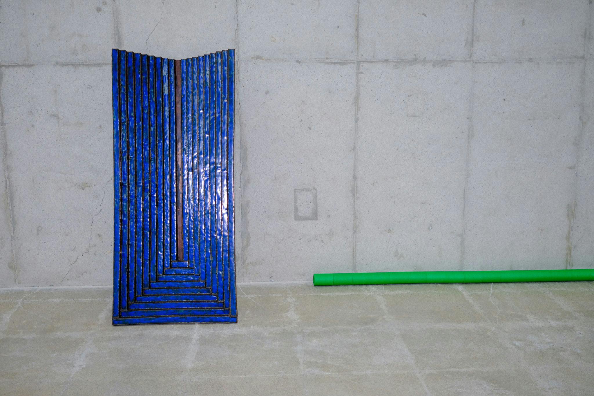 A Blue Chilbo Enamel Sculpture by Kwangho Lee in his concrete Seoul Studio | Photo by Kristen de la Vallière