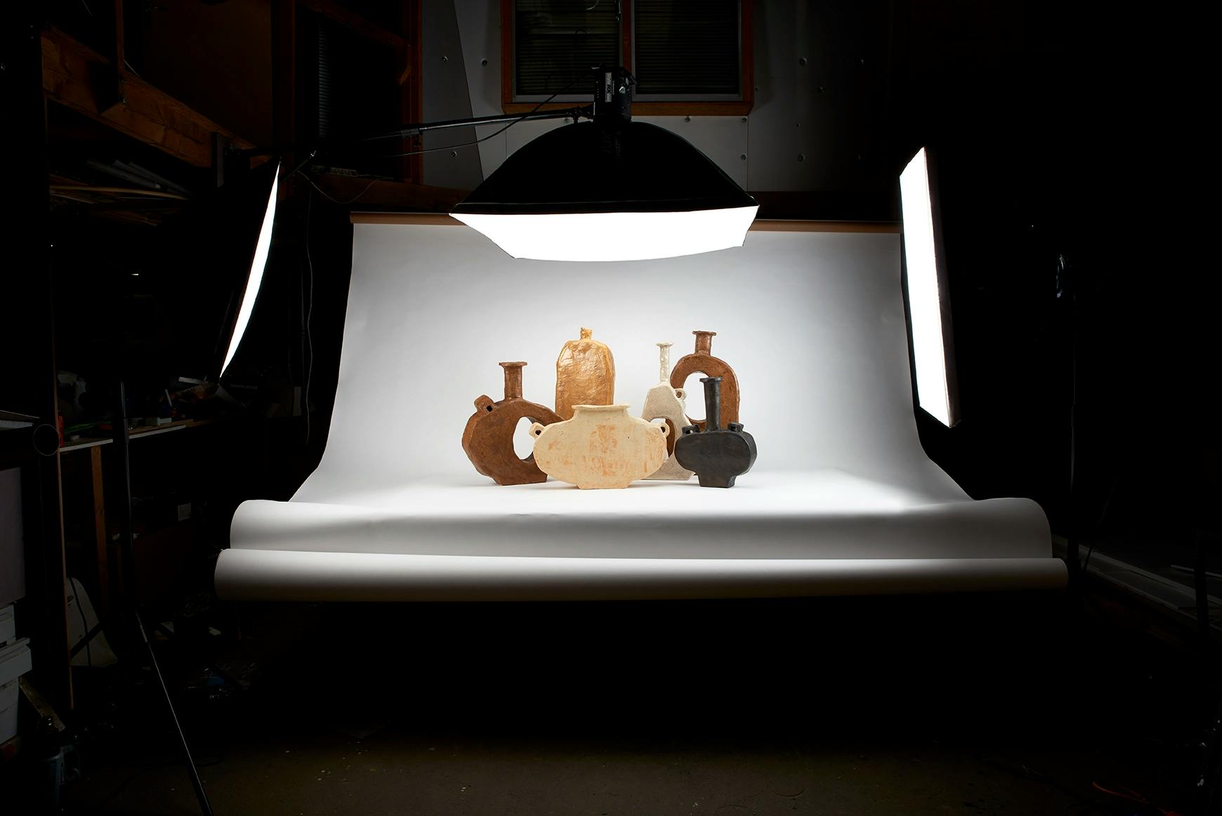 A collection of Willem van Hooff's ceramic vases in the photo studio