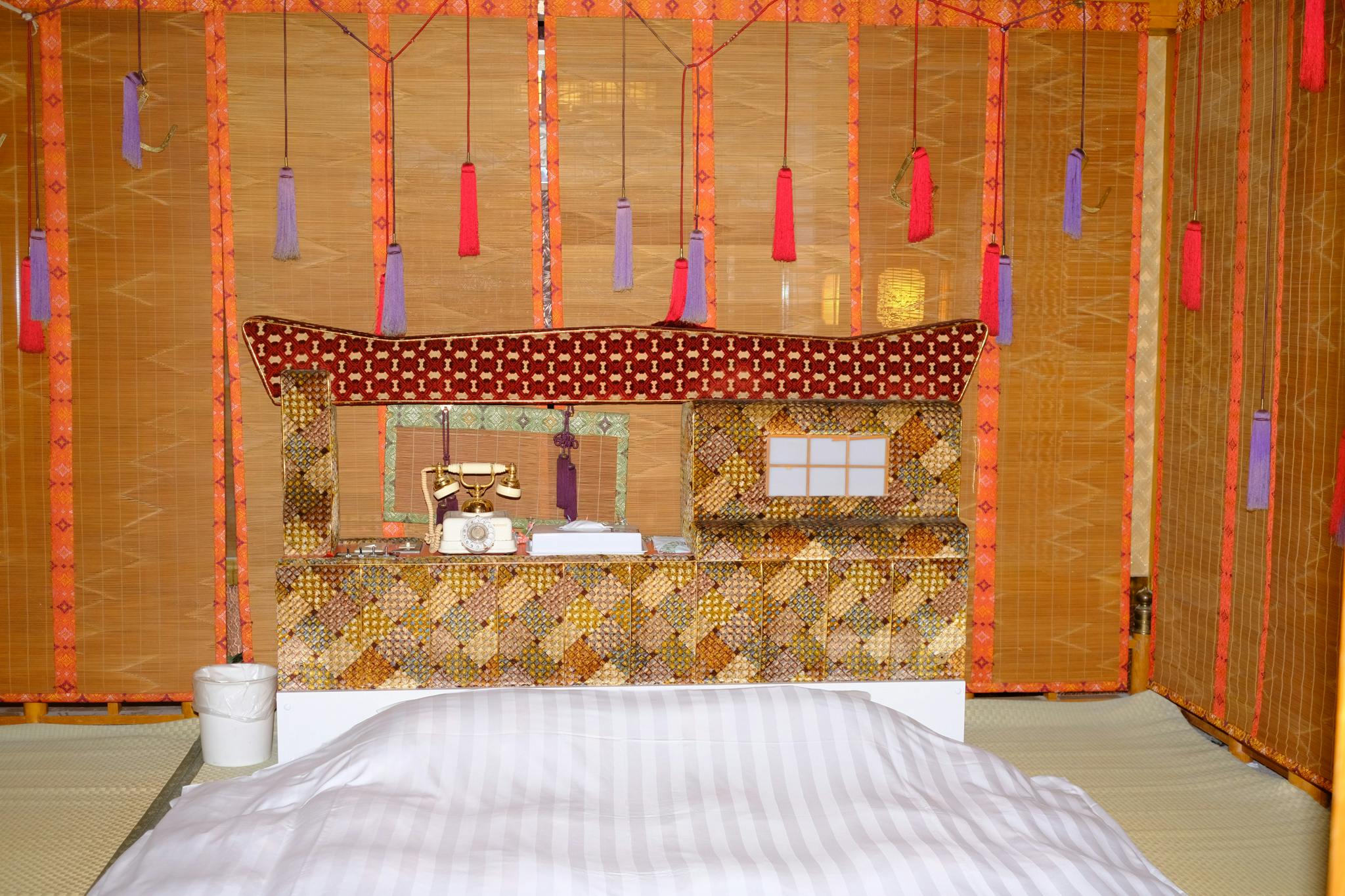 The bed in the historic themed 'Japanese Room' at Hotel Famy Love Hotel