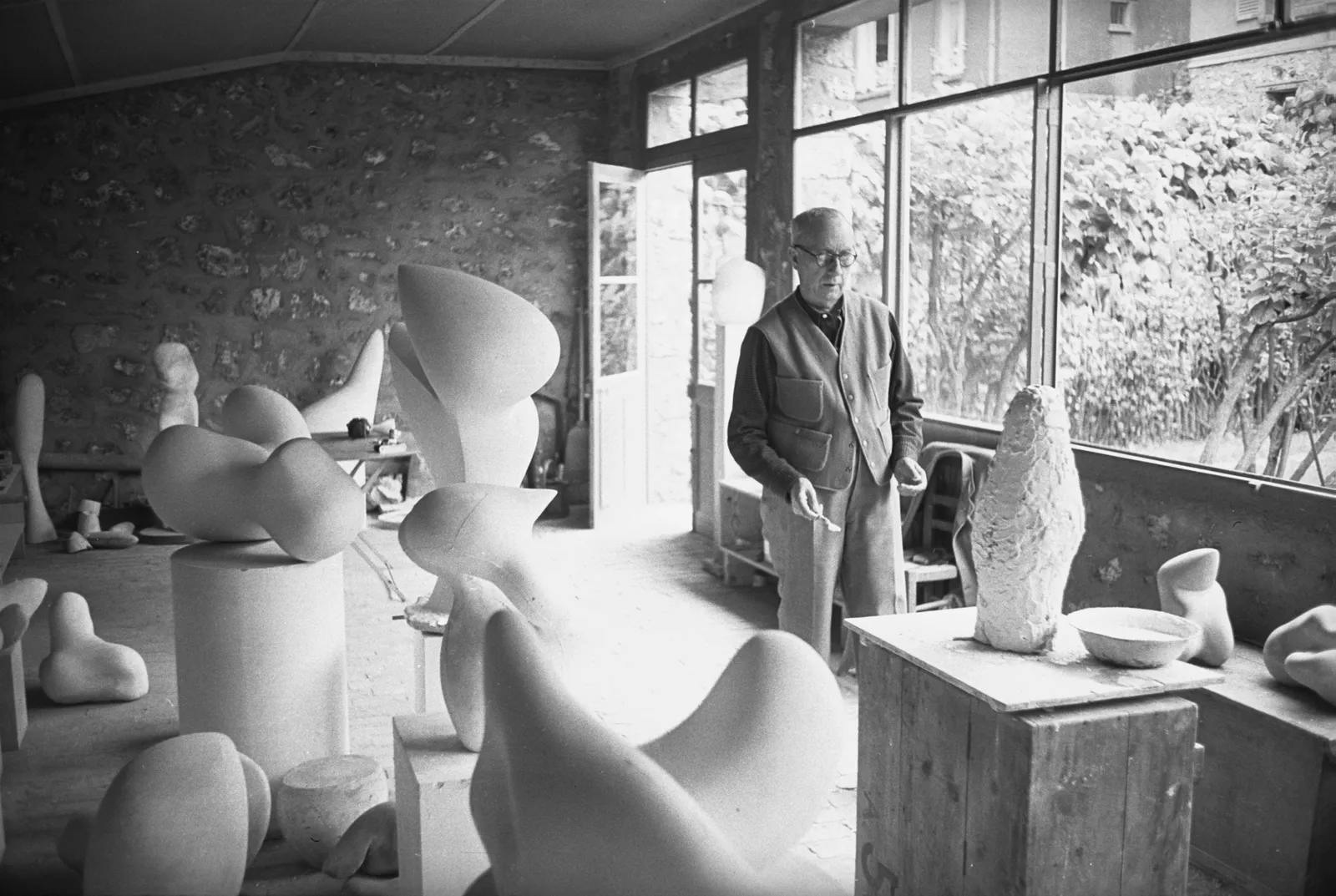 Jean Hans Arp in his studio in 1957.