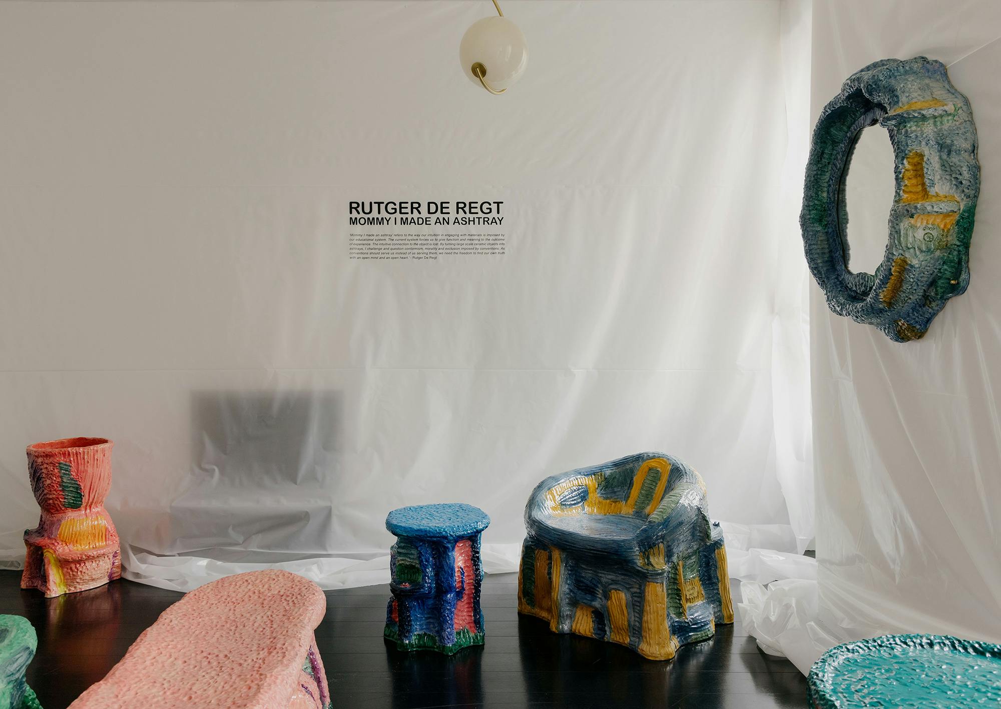 ‘Mommy I made an ashtray’ is a collection of brightly coloured ceramic objects. The idea behind the collection is highly personal. Rutger de Regt goes back to his earliest memories of working with clay and creating objects based on intuition, naivety and playfulness. To translate the childlike imagery into large scale ceramic objects, he developed a new clay building technique, based on his inventive balloon sculpting process.