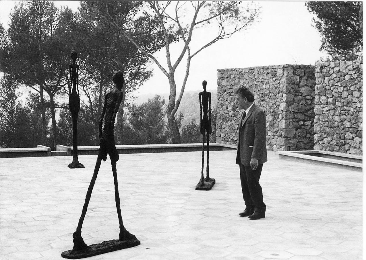 Giacometti with his outdoor sculptures in Fondation Maeght in 1947.