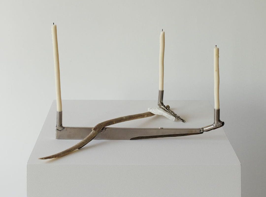 “Lean 2“ Exhibition Shot at 'Grayscale' a Max Radford Gallery Group Exhibition in London, UK. Materials include Stainless steel, found branches, palo santo wood, paint, woven metal detail, 2023