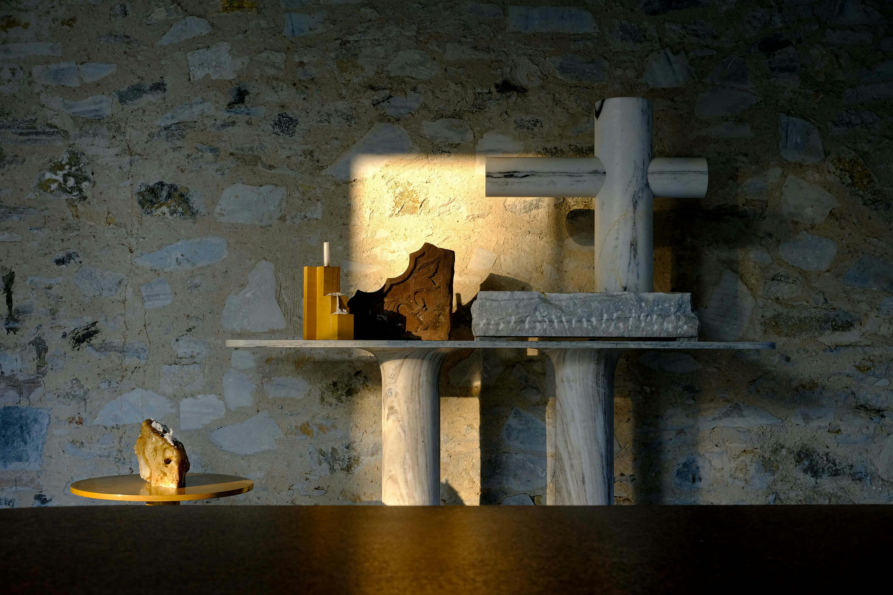 A corner of Studio Raw Material’s home in Makrana, Rajasthan, captured at dusk—featuring a cluster of marble furniture pieces designed on site.