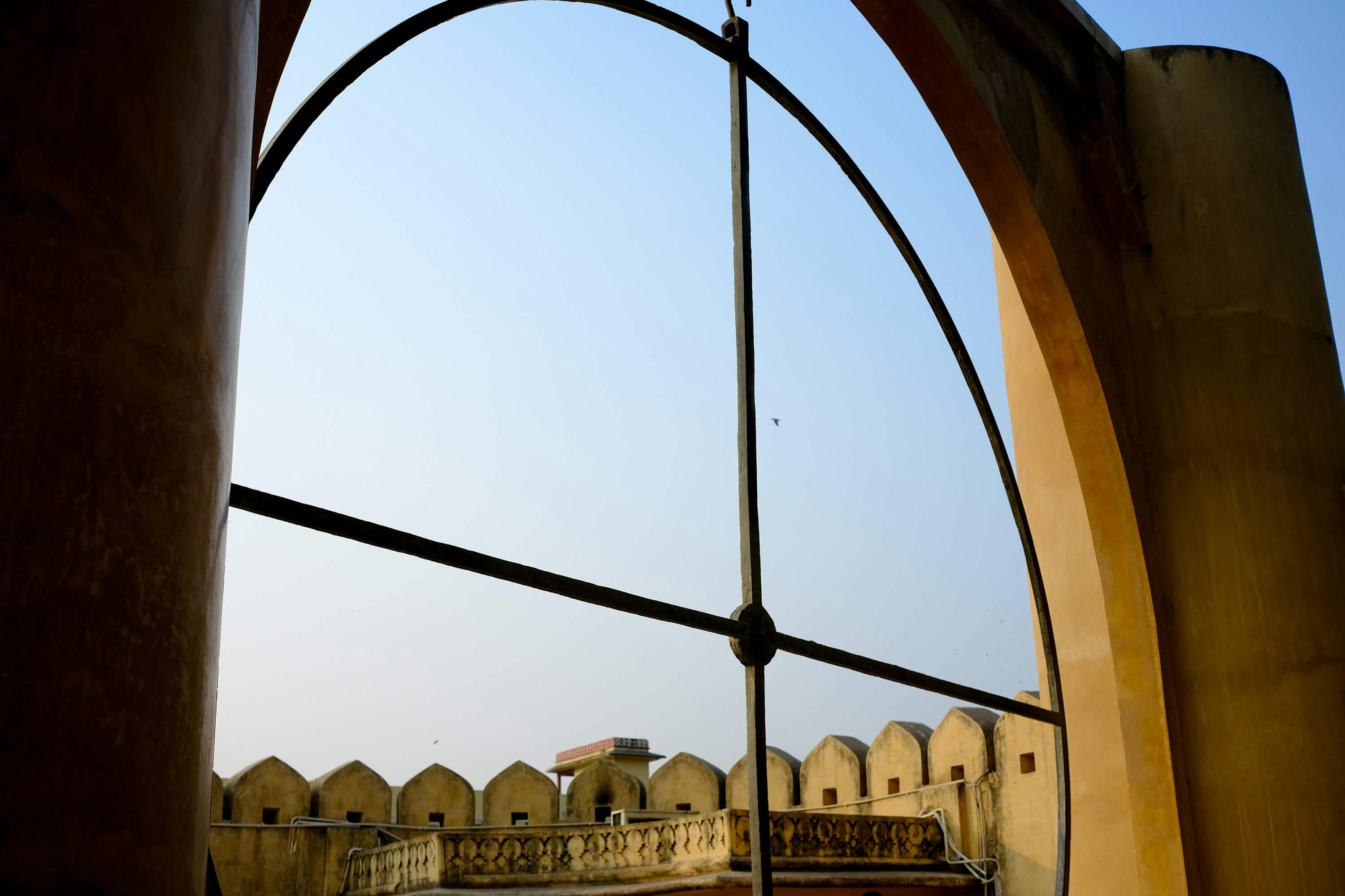 Jantar Mantar astronomical observatory in Jaipur, India, featuring historic stone instruments used for measuring time, tracking celestial bodies, and observing astronomical phenomena.