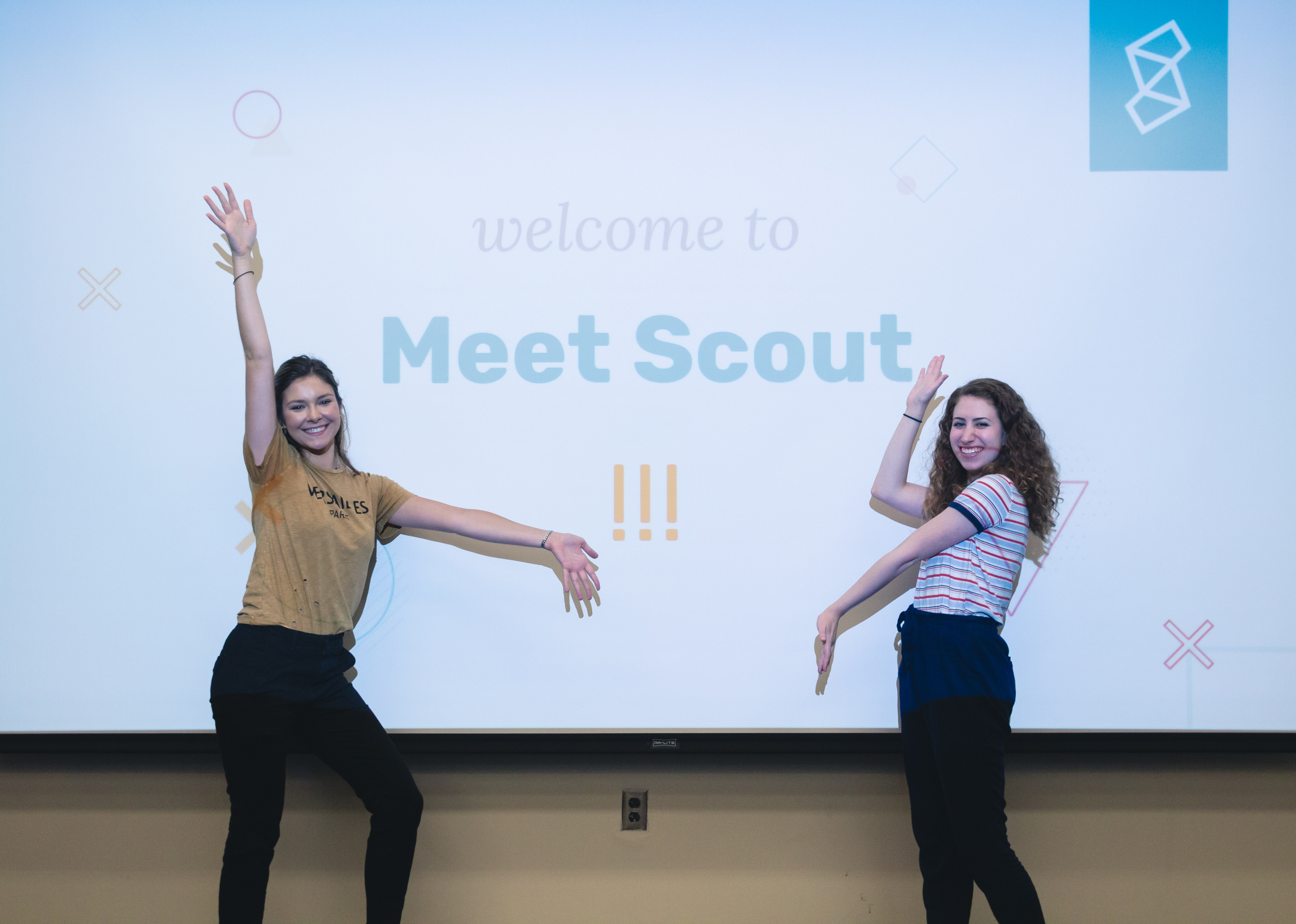 Two members of Scout's management team give a presentation about the organization.