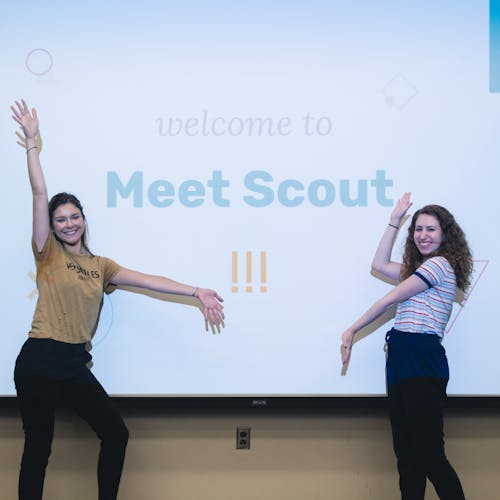 Two members of Scout's management team give a presentation about the organization.