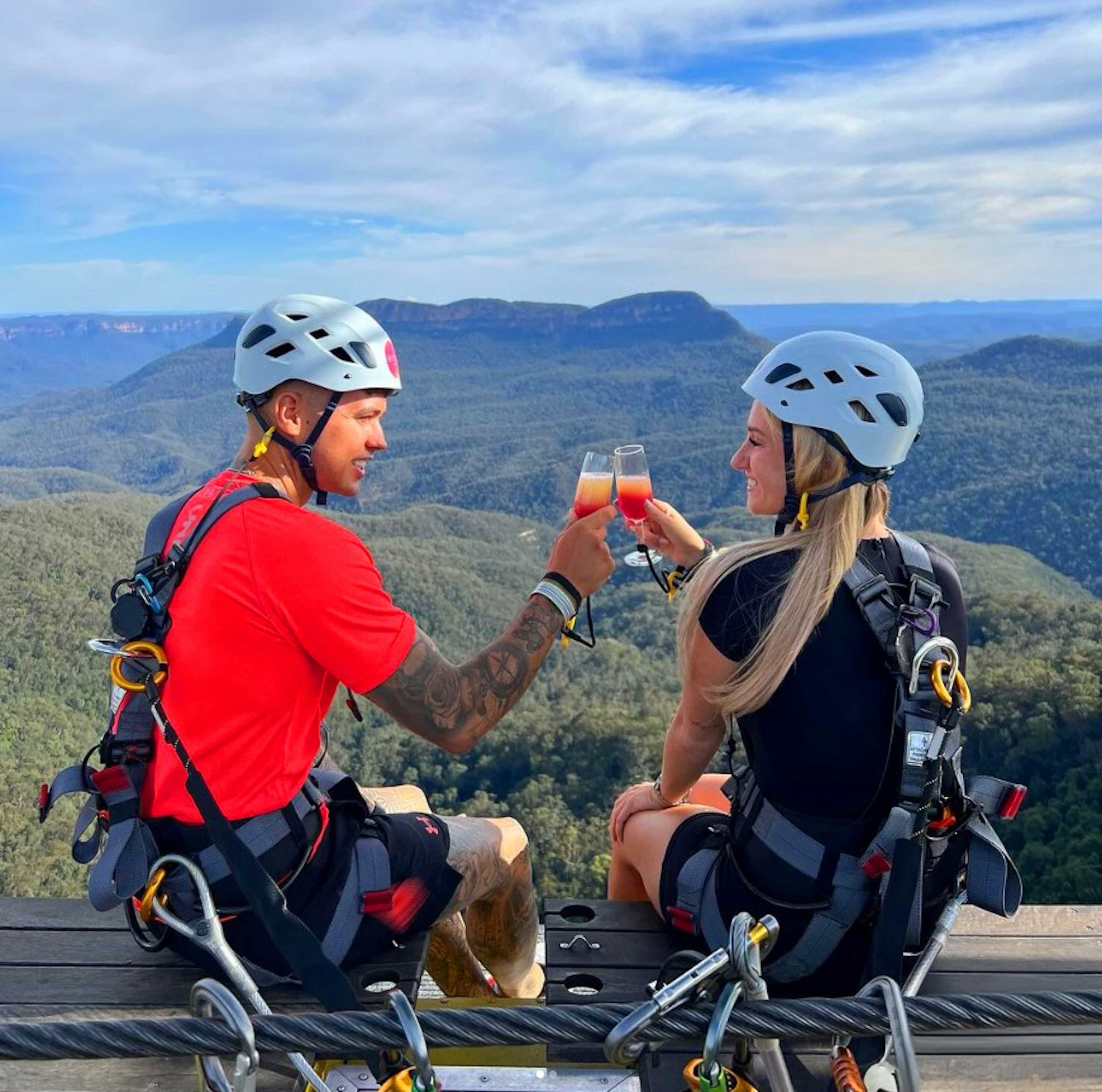ouple toasting on the Scenic Skyway