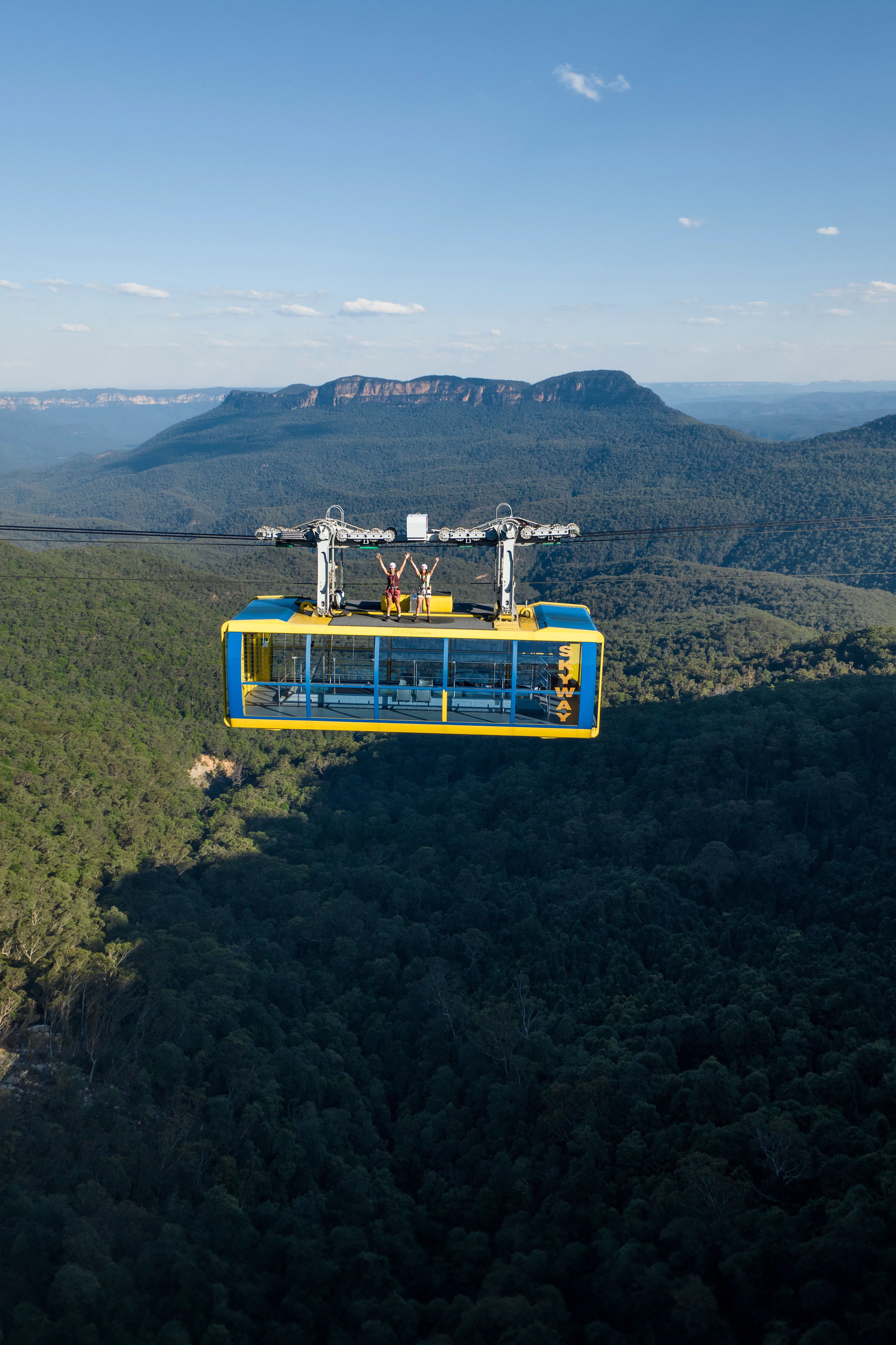 Two girls on top of the Scenic Skyway