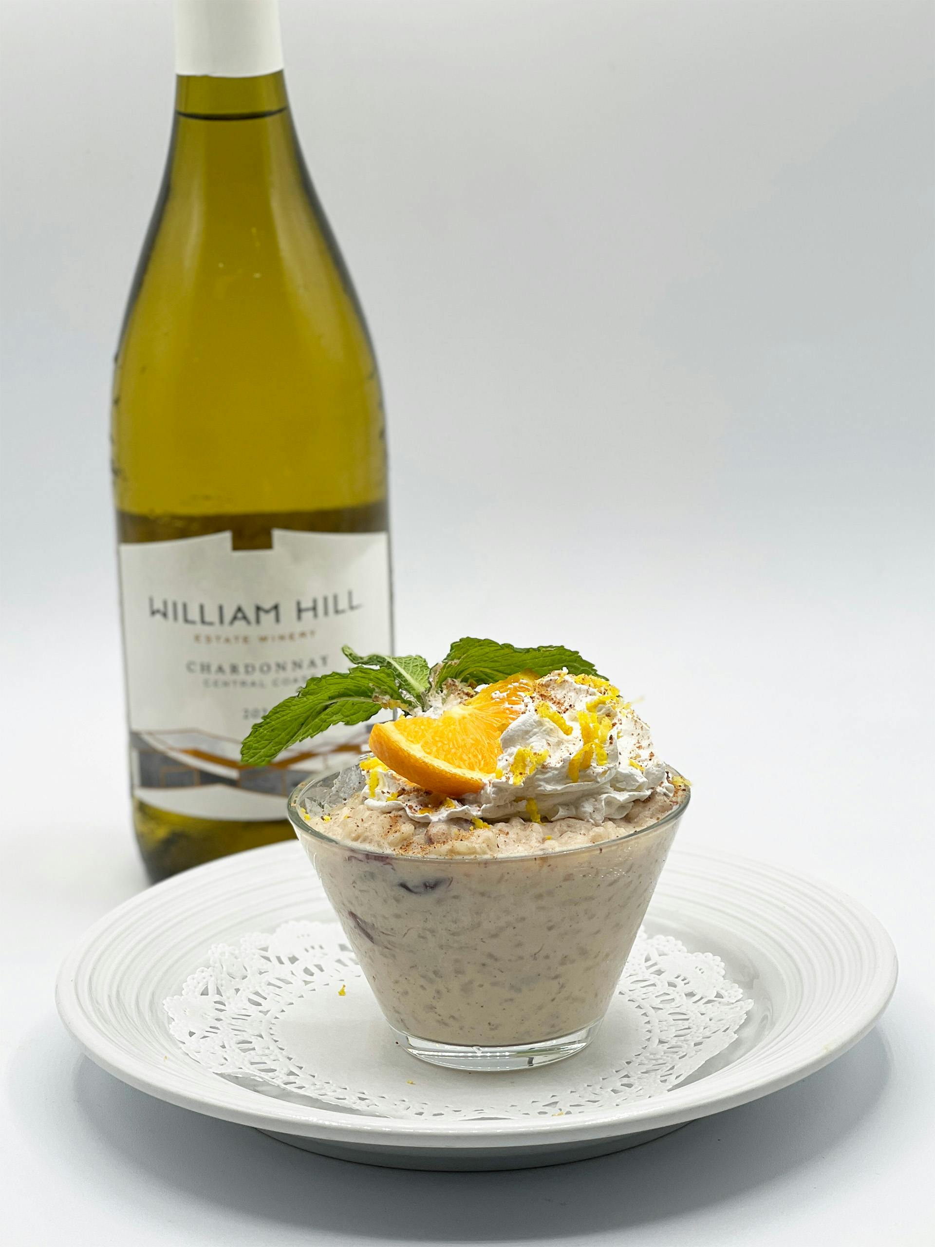 Fourth Course - Rice Pudding, Golden Raisins, Lemon and Orange Fresh Cream. Paired with William Hill Chardonnay.