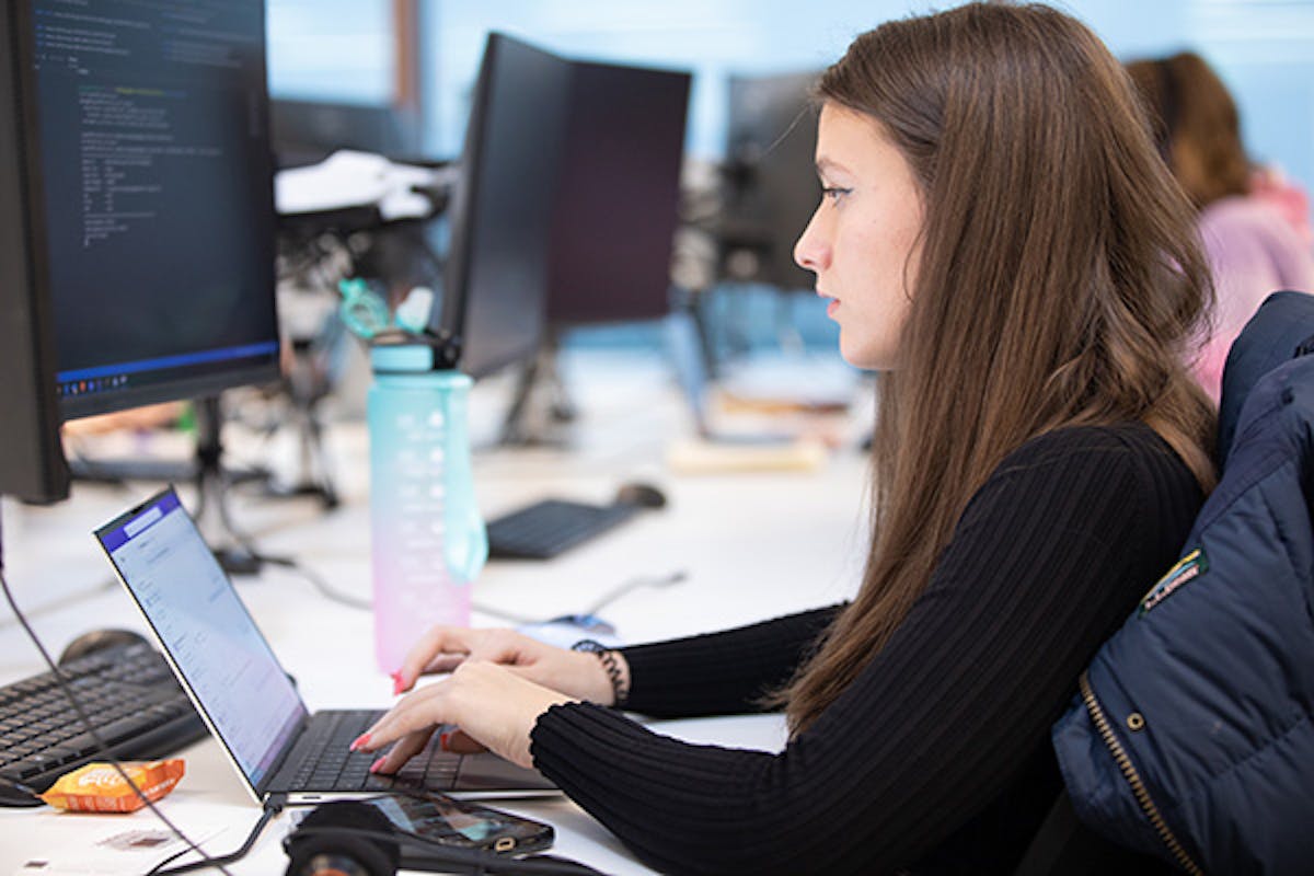Woman working at a computer