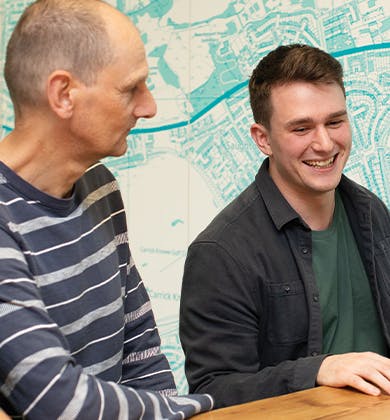 Two people in a meeting