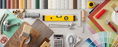 A set of home renovation tools and colour charts