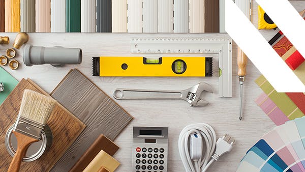 A set of home renovation tools and colour charts