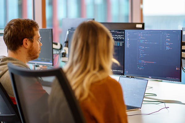 Two developers pair programming