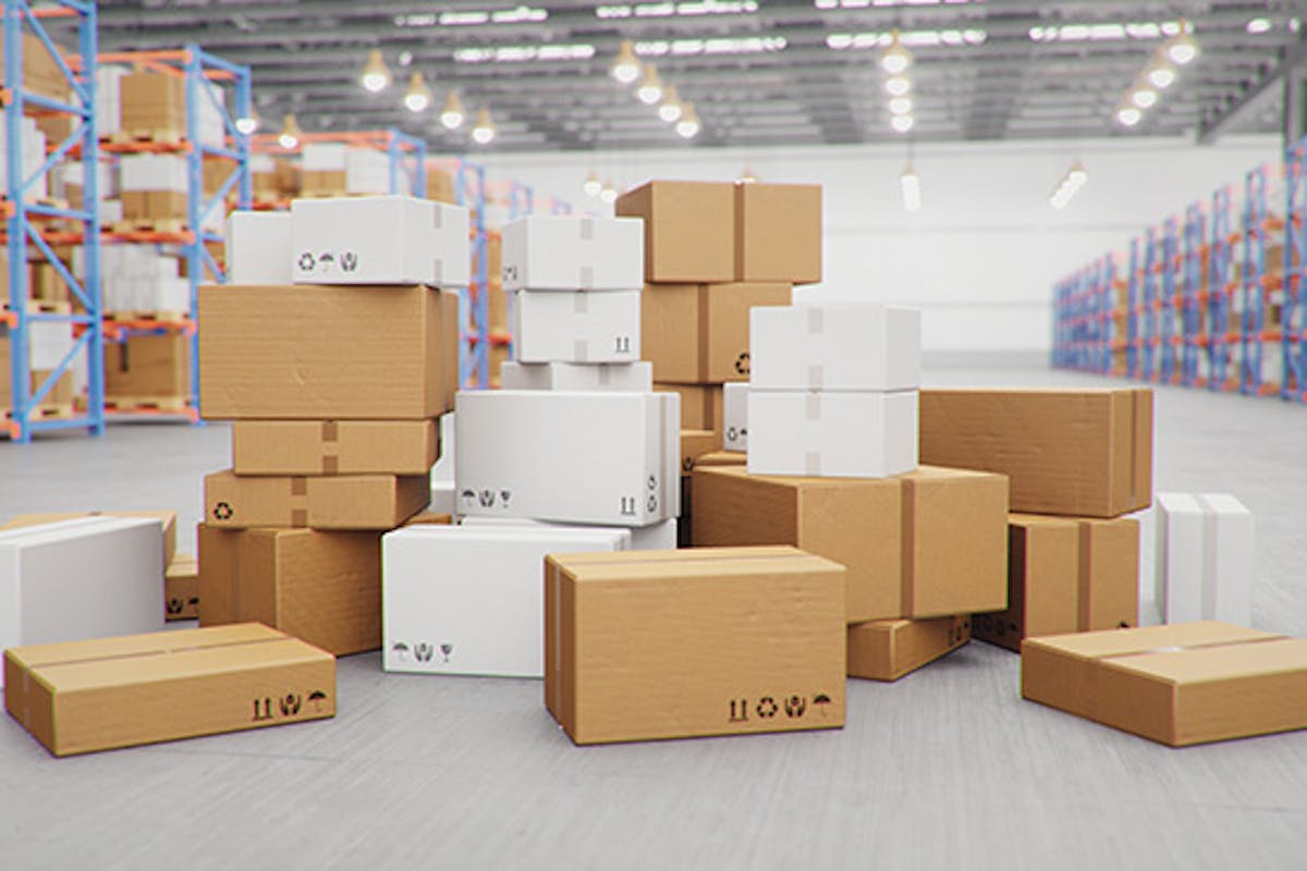 A pile of cardboard boxes in a warehouse