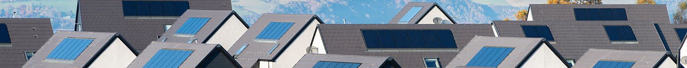 Houses with solar panels on their roofs in Scotland