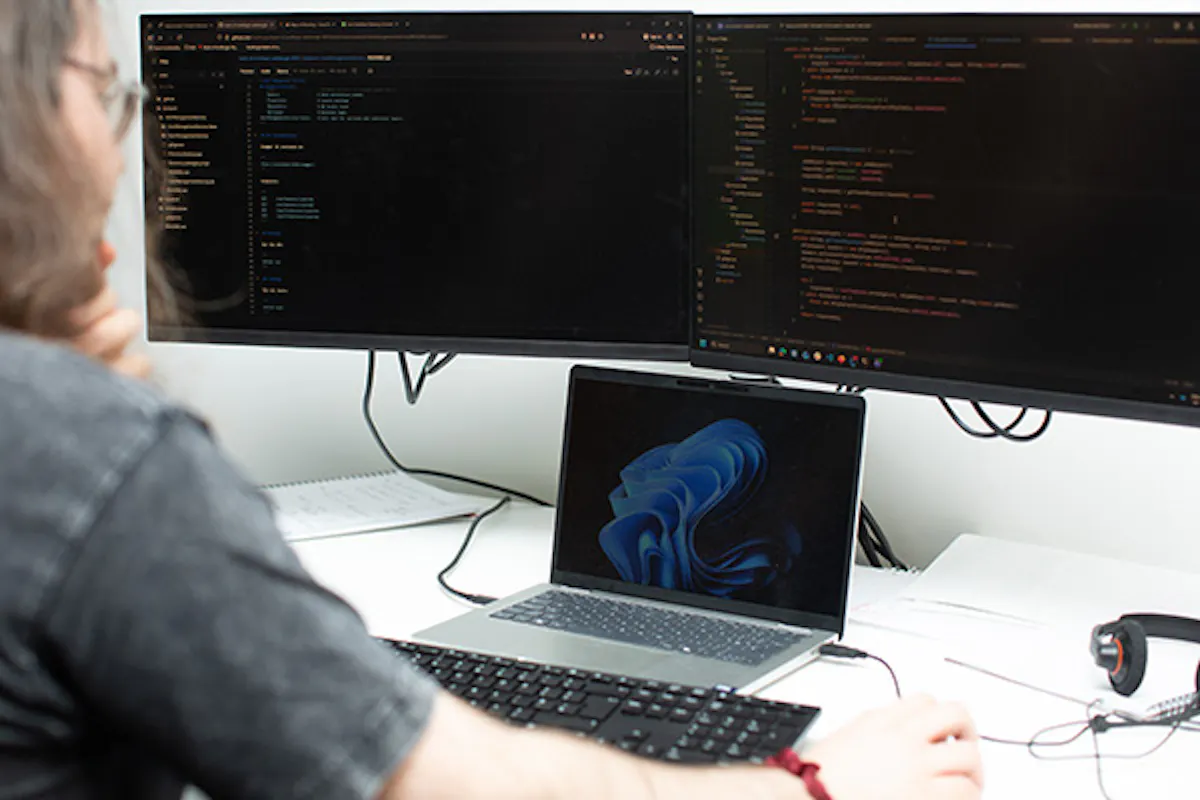 Developer looking at some computer code