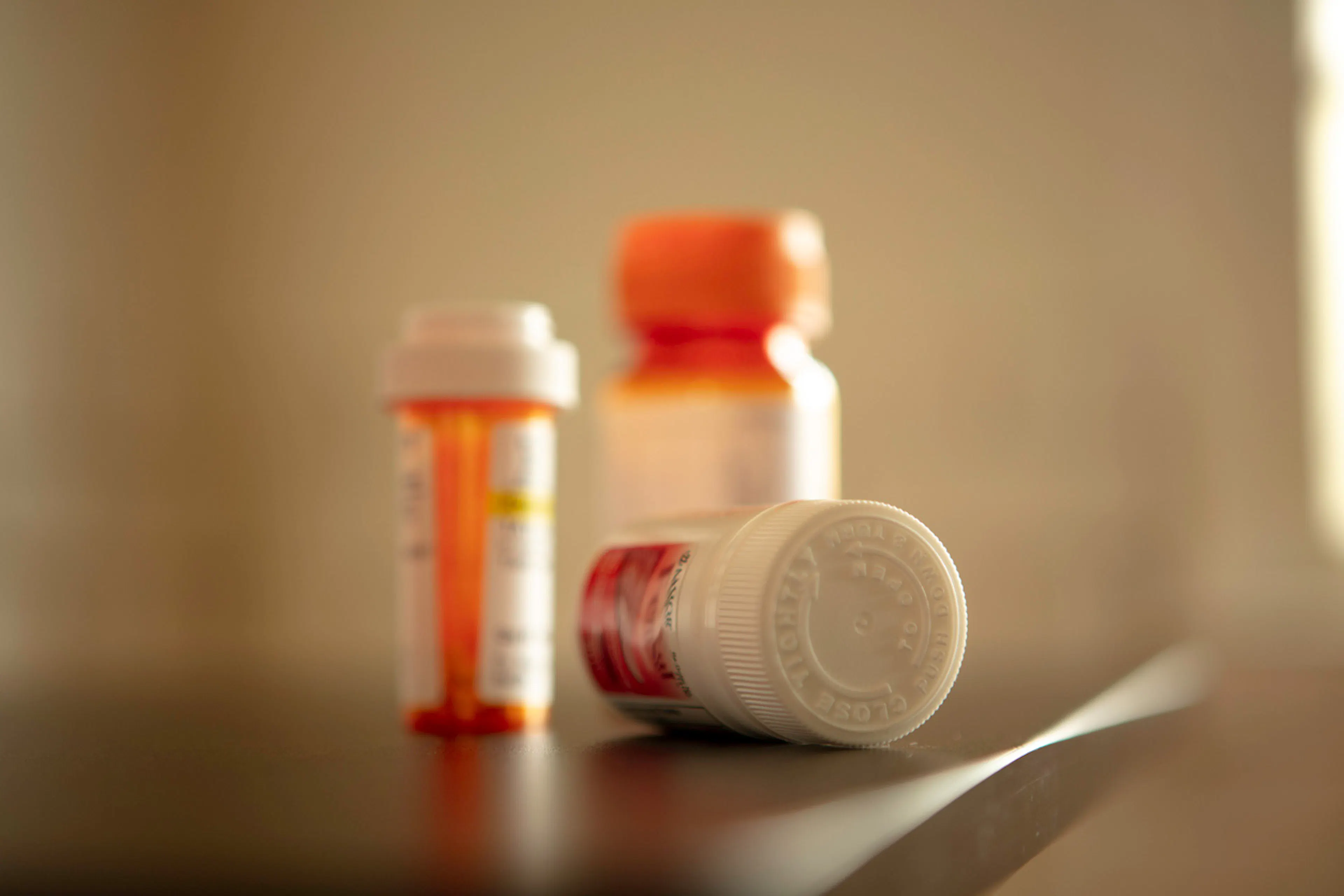 Pill bottles on a dresser that may show up on a drug test