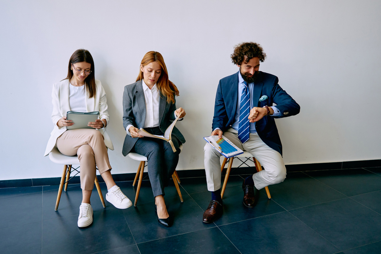 three candidates waiting for an interview