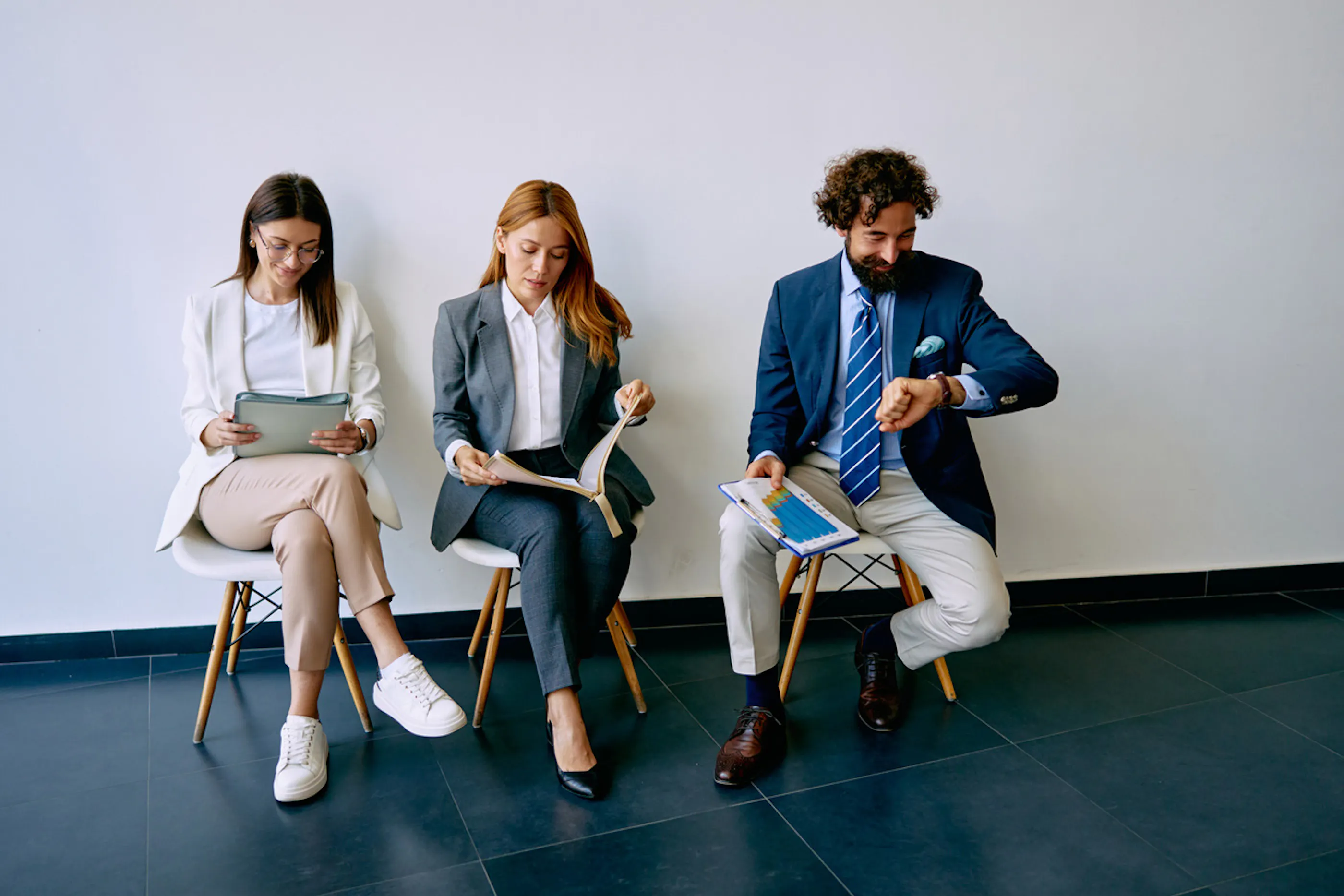 three candidates waiting for an interview