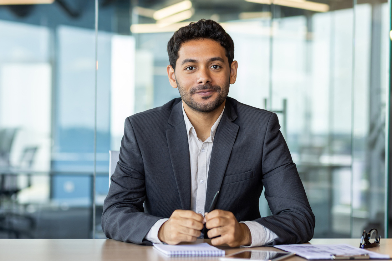 businessman looking friendly at the camera