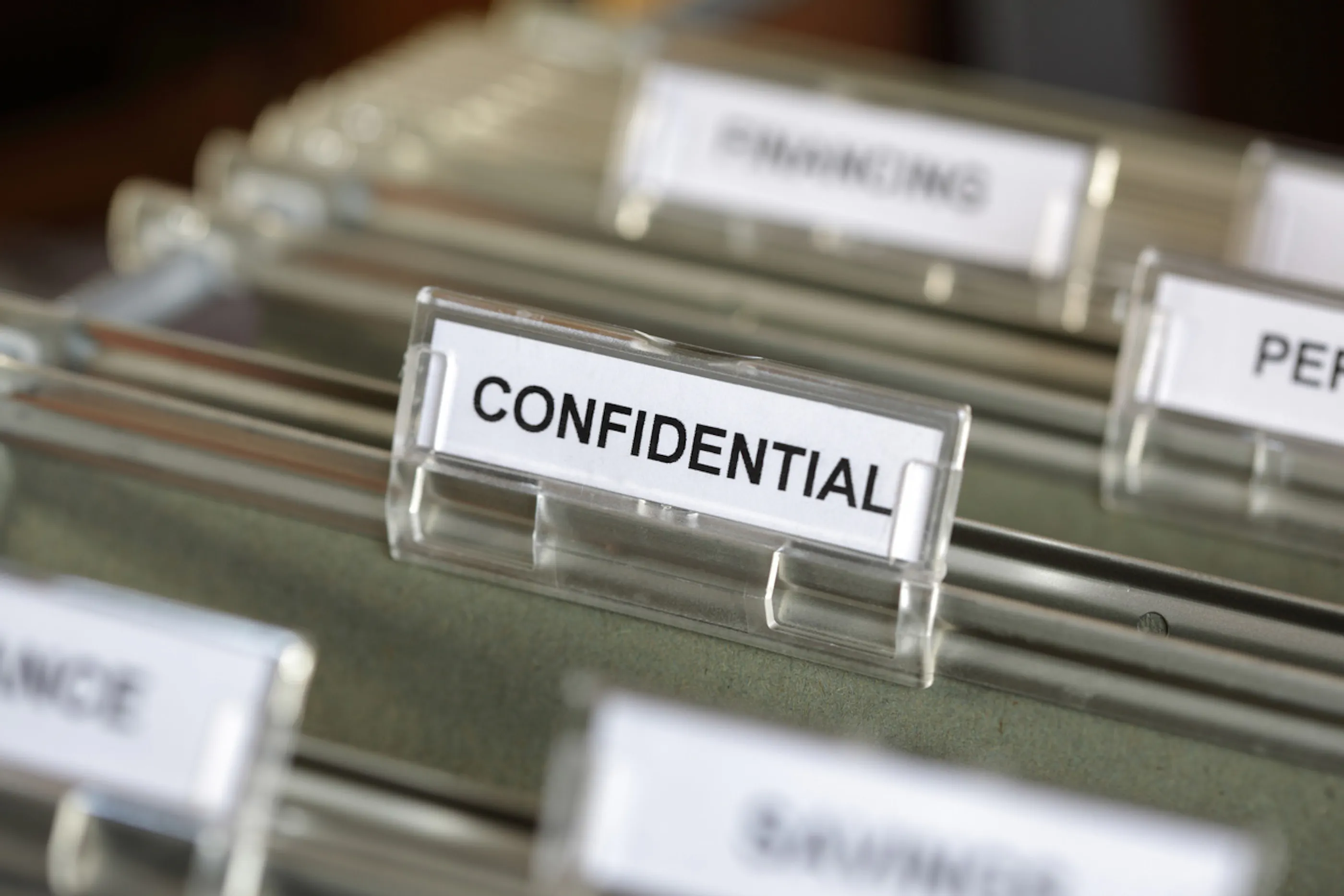 file folder that reads confidential