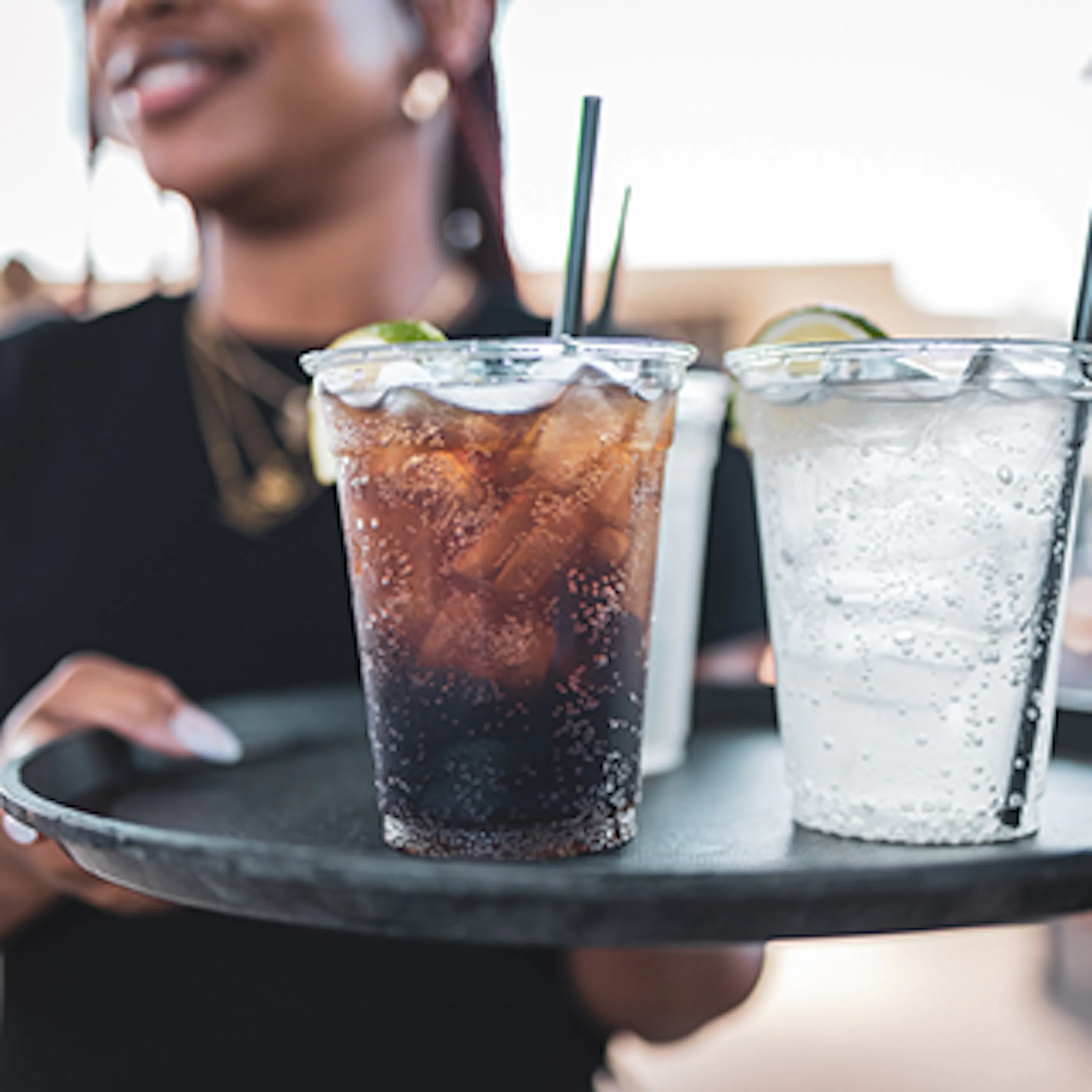 waitress carrying drinks