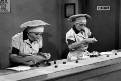 Ethel and Lucy working in a chocolate factory in I Love Lucy
