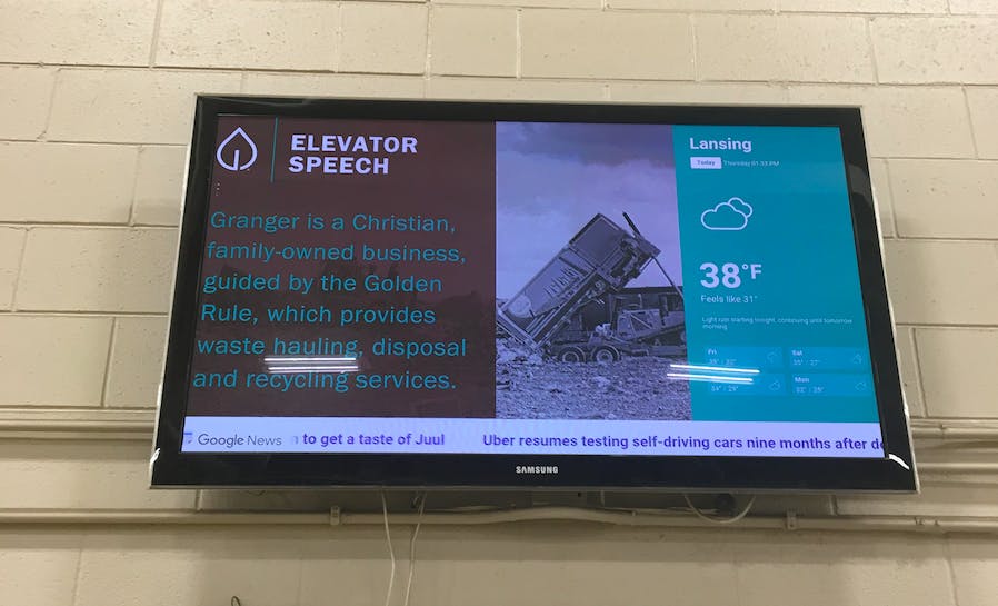 wall with digital signage screen