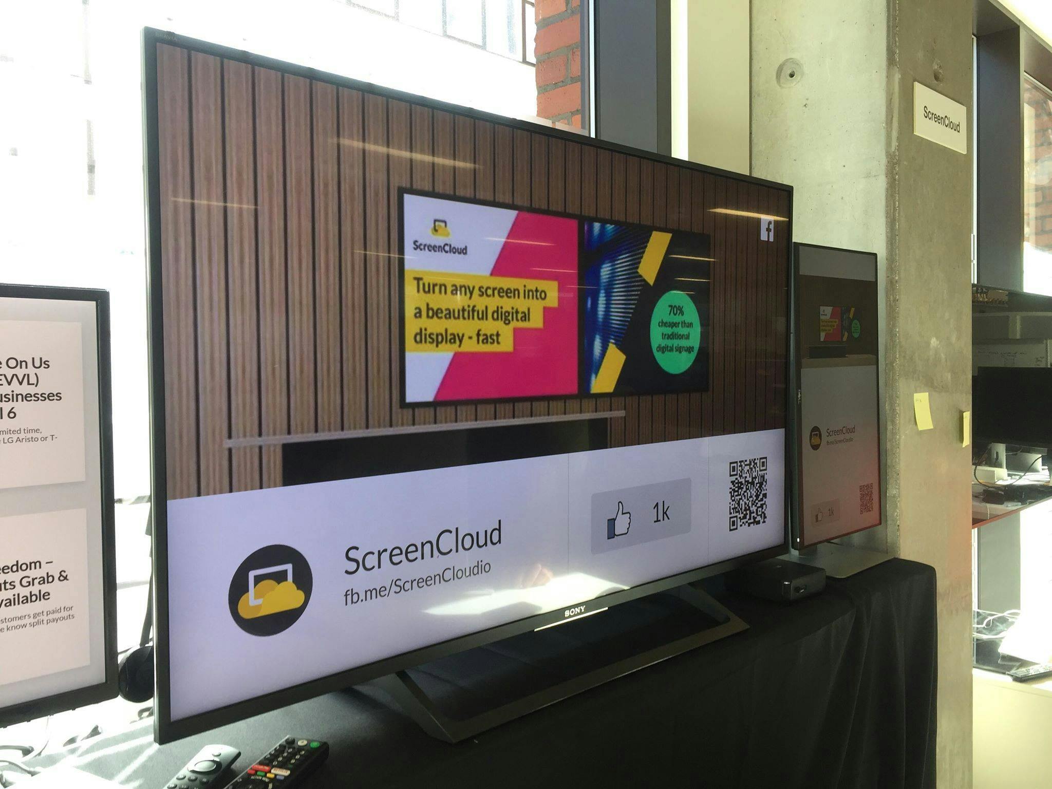 office wall with digital signage screen