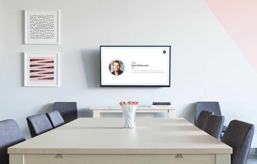 meeting room with digital signage screen
