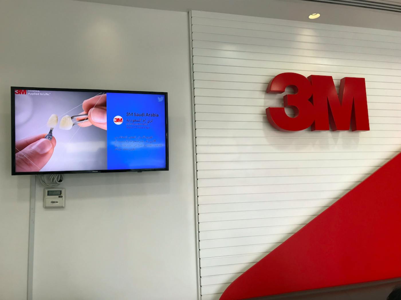office wall with digital signage screen