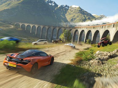 Gameplay of a car speeding towards a viaduct in a scenic, mountain landscape