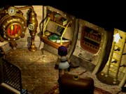 Pixelated gameplay of a woman character in a chamber with a furnace and an arrow pointing up a ladder