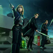 Three young adults stand against an industrial night, green-tinged sky, holding swords.