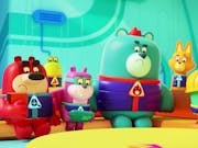 animated scene of a group of colourful bears, some wearing yellow hard hats.