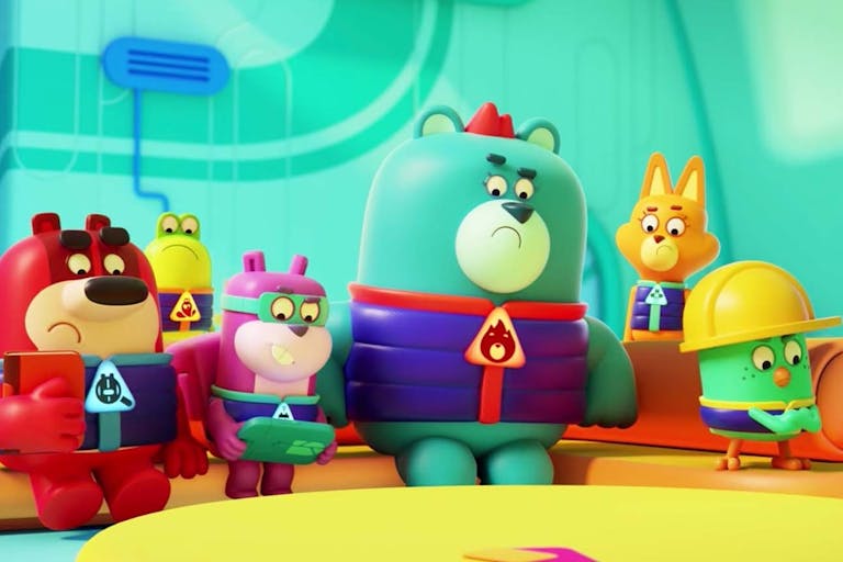 animated scene of a group of colourful bears, some wearing yellow hard hats. 