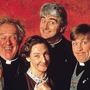 Grouping a three white men in vicar dog collars and a put together white woman