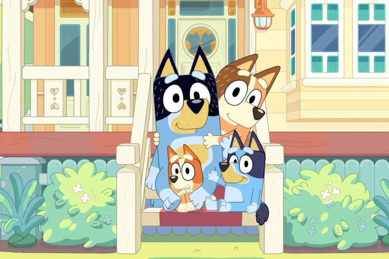 Colourful animation of a family of blue and light brown dogs