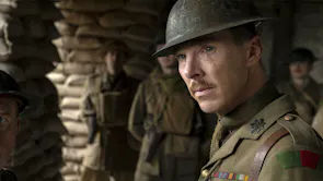 A white army soldier, with an eye scar, looking into the distance