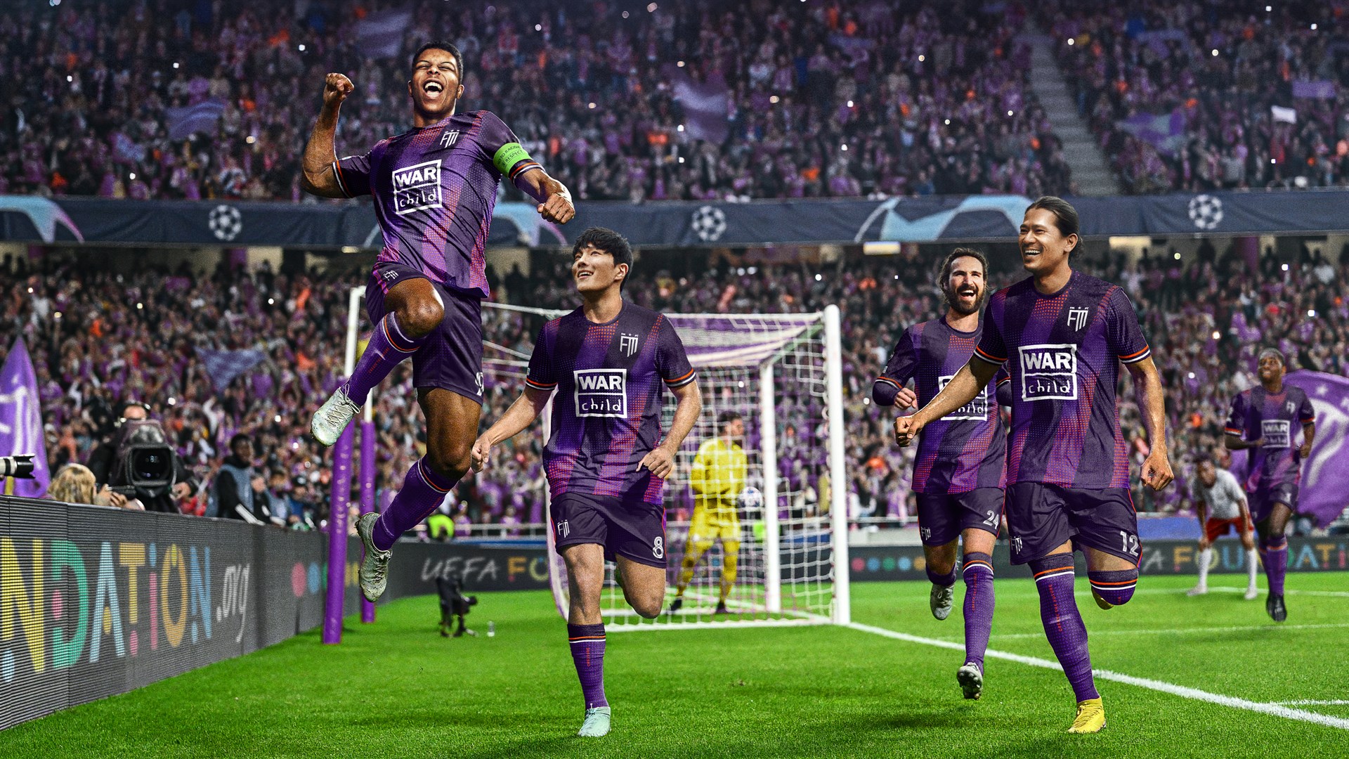 Game still of realistic male football players in purple kit running on the pitch celebrating with big crowds in the background