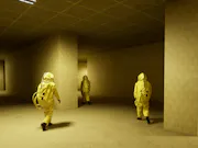 Three people is hazmat suits running through a completely vacant dark building with tall yellow walls