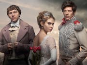 Two white men and a woman in 1800s clothes are looking at the camera. The woman is standing with her back at us turning her head and holding a bouquet of red roses behind her back