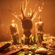 Gameplay of three burning tree stumps with mouth like bark with an orange glow