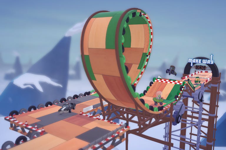 Gameplay of colourful patchwork driving track built into a loop on a rickety platform
