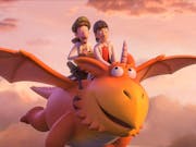 Animation of two characters riding on the back of a friendly looking red and orange dragon